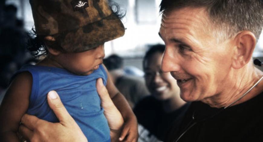 Man holding a baby