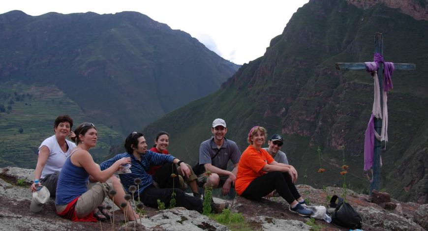 Group of people on top of a mountain
