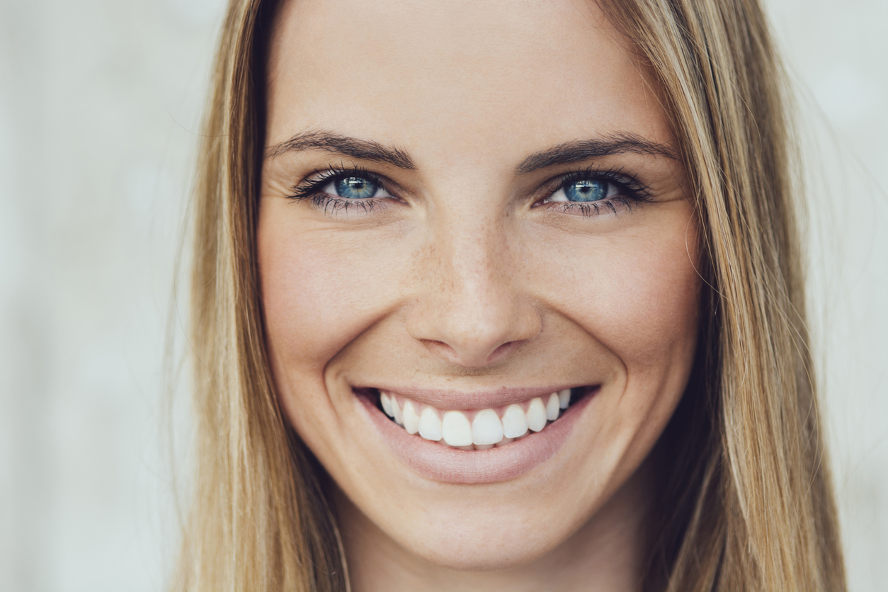 Woman with perfect skin highlighting Botox in Denver