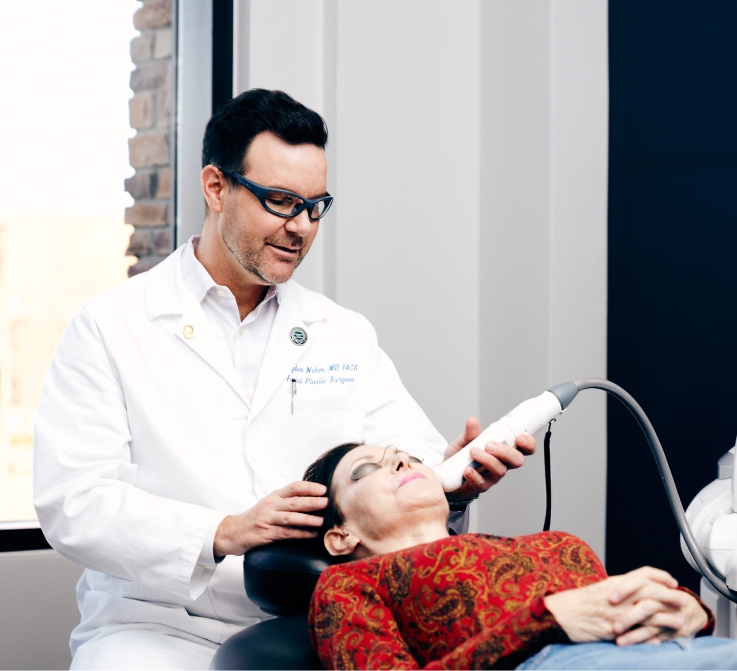 Dr.Weber performing laser skin resurfacing