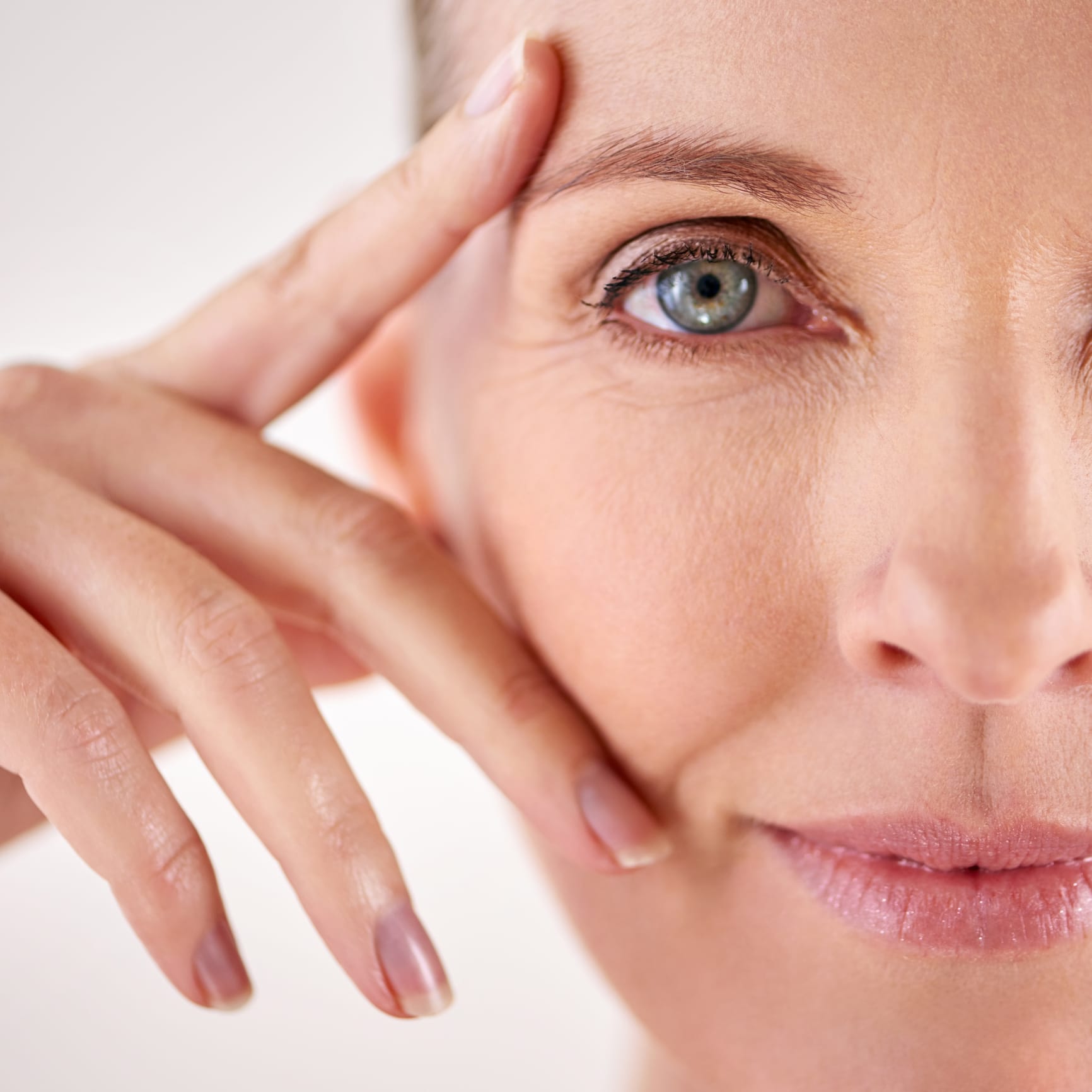Woman with beautiful skin highlighting facial fillers in Denver