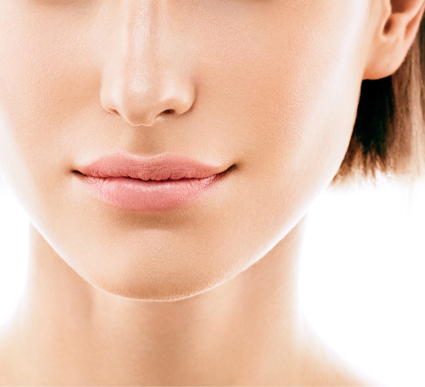Closeup of a woman's nose and mouth